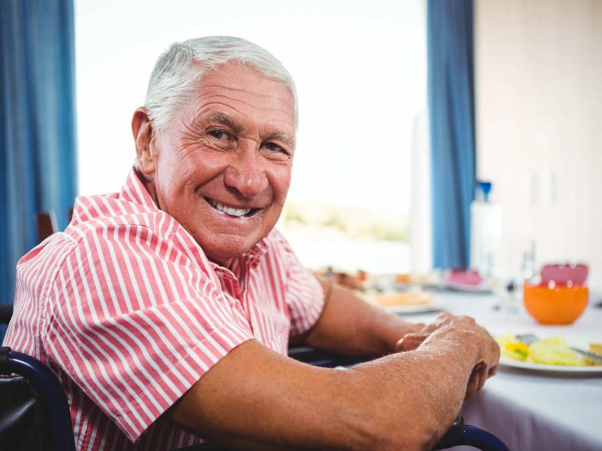 Happy senior enjoying his day at a Naples, Florida adult day care.