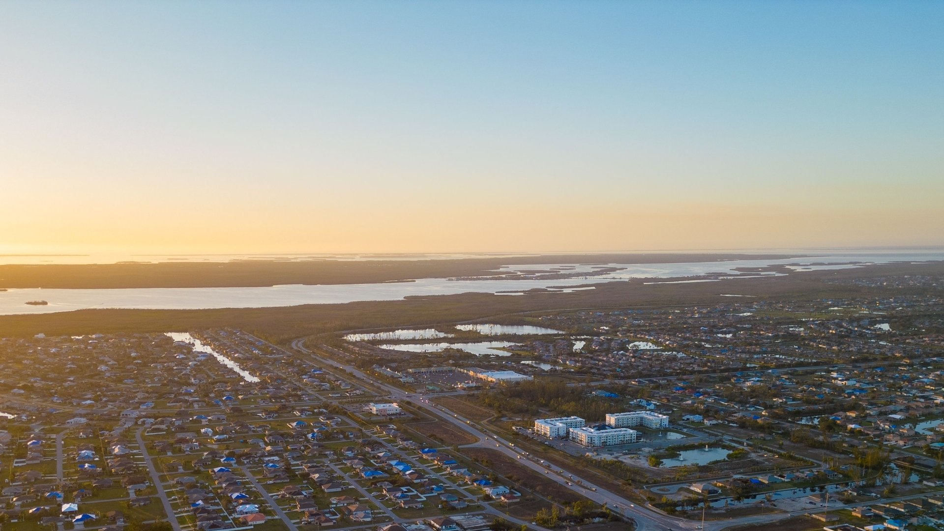 Aerial view of Cape Coral, Florida canals and homes, showing the community served by nearby adult day care centers.