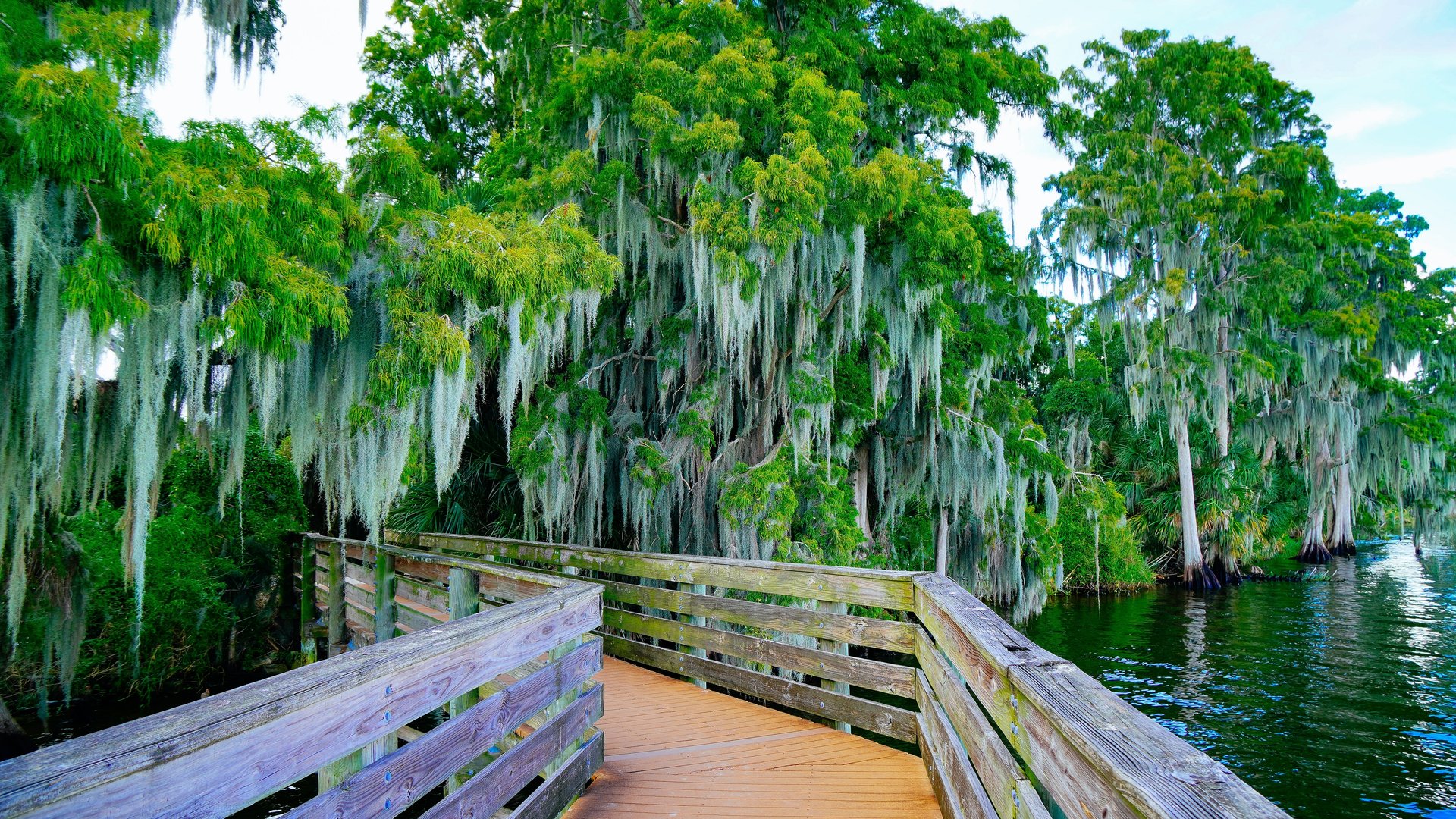 Walkway along Lake Hancock in Lakeland, Florida, depicting the Central Florida area served by adult day care centers.