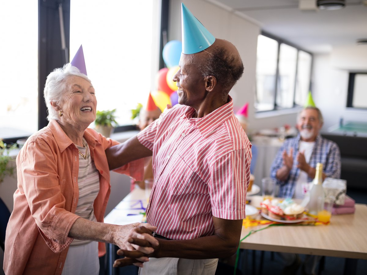 Seniors celebrating a birthday at an adult day care in Port Charlotte, Florida
